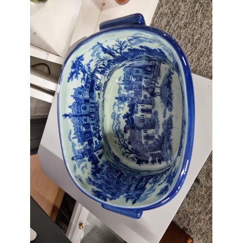 53 - A quantity of collectables including an Ironstone blue and white foot bath along with a selection of... 