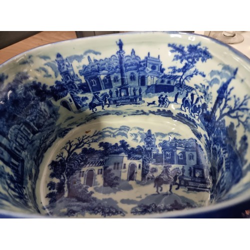 53 - A quantity of collectables including an Ironstone blue and white foot bath along with a selection of... 