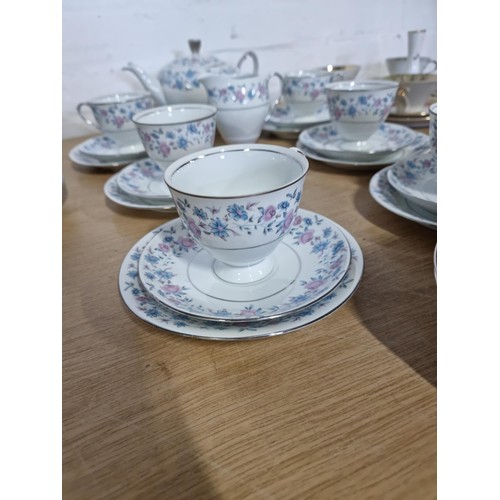 55 - A 26 piece Wawel Poland tea set complete with teapot, 6 trios, milk jug and 5 dishes in a blue and p... 