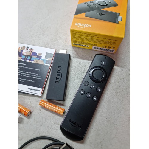 103 - A new and boxed Now TV smart box along with a boxed amazon Fire TV stick with an Alexa voice remote.... 