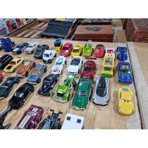 100 - A very large quantity of loose diecast model cars, all mostly in good looked after condition with a ... 