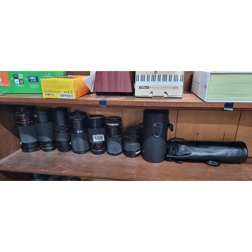 108 - A quantity of 7x camera zoom lenses by various makers to include Hanimex, Prinz, etc. Please study t... 