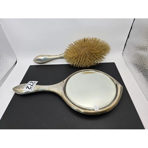 272 - An antique heavy duty hallmarked silver backed dressing table mirror and brush having an engraved de... 