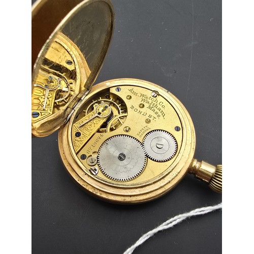 275 - A good quality heavy gold plated half hunter pocket watch by A.W Waltham, the case is marked inside ... 