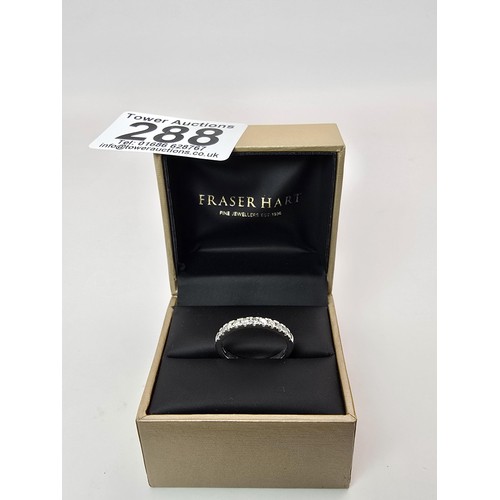 288 - A fine quality hallmarked 950 platinum diamond ring inset with 11 diamonds which are very sparkly an... 