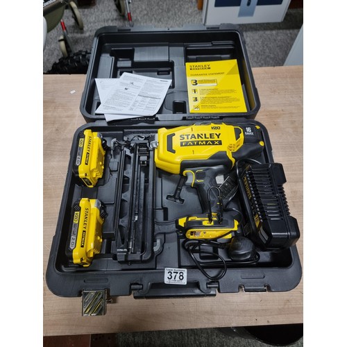 378 - A cased Stanley FatMax 18V, 16 gauge finishing nail gun, in as new condition and complete with 2 bat... 