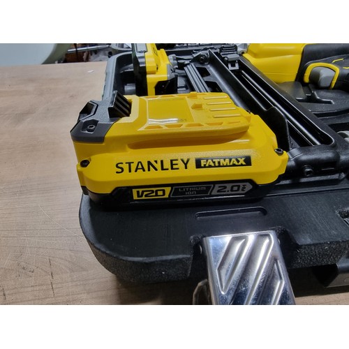 378 - A cased Stanley FatMax 18V, 16 gauge finishing nail gun, in as new condition and complete with 2 bat... 