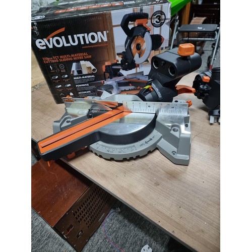 380 - An as new Evolution R210SMS circular saw, as new in box complete with instructions