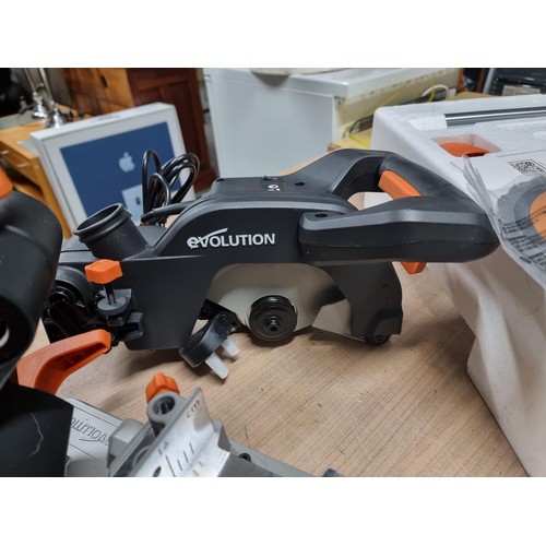 380 - An as new Evolution R210SMS circular saw, as new in box complete with instructions