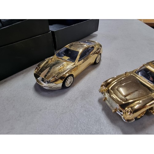 102A - 3x good quality diecast vehicle sets to include a Corgi 007 40th anniversary, 24ct gold plated 2 car... 