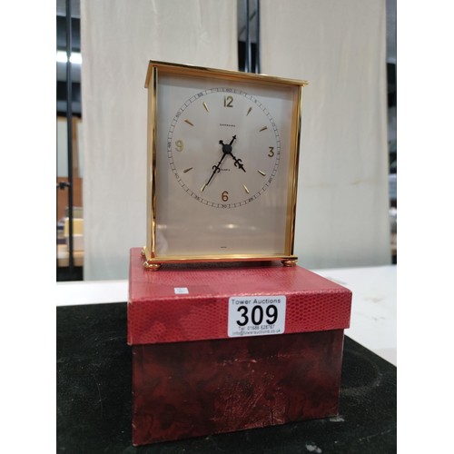 309 - A very good quality brushed brass cased quartz desk clock by Garrard (1 of the finest clock makers),... 