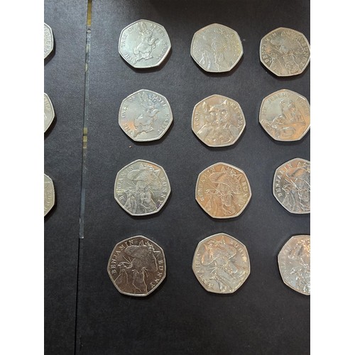 265 - A large collection of 21x collectable 50 pence coins all relating to the Beatrix Potter series to in... 