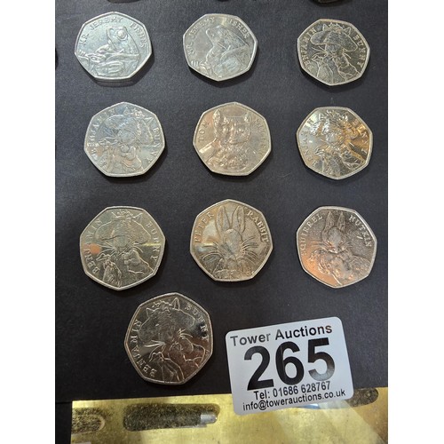 265 - A large collection of 21x collectable 50 pence coins all relating to the Beatrix Potter series to in... 