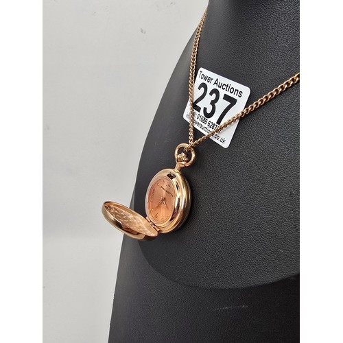 237 - An as new Rennie Mackintosh rose gold ladies fob watch and chain featuring a classic Rennie Mackinto... 