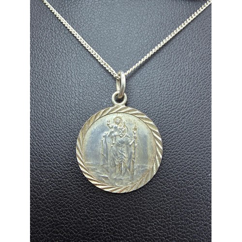 239 - A 925 silver St Christopher pendant on a 18