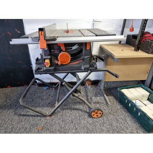 372 - A good quality Evolution circular saw work bench on a fully adjustable bench on trolley wheels, come... 