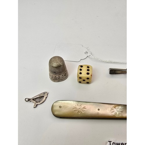 284 - A quantity of good quality hallmarked silver collectables to include a H.M silver thimble by Charles... 