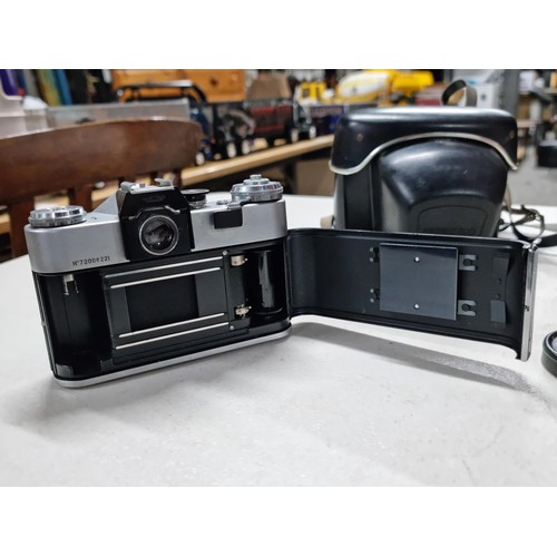 3 - A cased vintage Paxette 35mm camera, along with a cased Prinzflex 500 35mm camera with a Helios 44-2... 