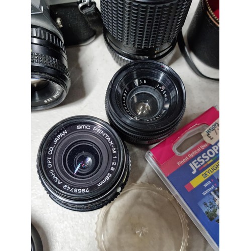 6 - Pentax ME Super with standard lens 50mm, a wide angle lens and a variable tele photo lens 75/205, Vi... 