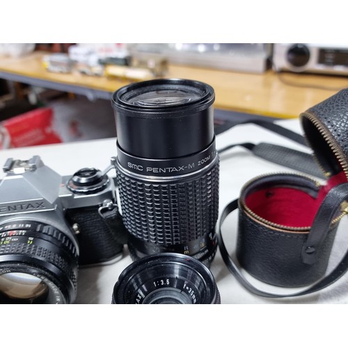 6 - Pentax ME Super with standard lens 50mm, a wide angle lens and a variable tele photo lens 75/205, Vi... 