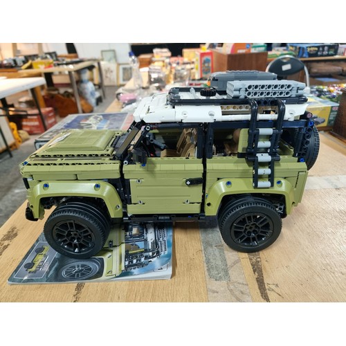 56 - Good quality hand built Lego style Land Rover Defender, complete with steering, independent suspensi... 