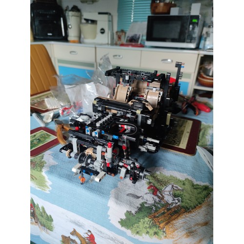 56 - Good quality hand built Lego style Land Rover Defender, complete with steering, independent suspensi... 