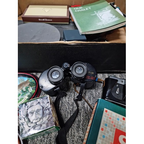 26 - A box containing a quantity of collectables including a pair of Boots Fleet 7x35 binoculars, a cased... 