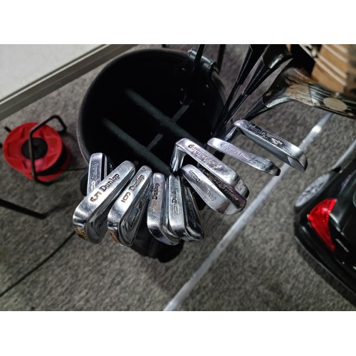 28 - A vintage 1960's Arnold Palmer power point golf club set including 4 woods (1,2,3,4), 9 irons (3,4,5... 