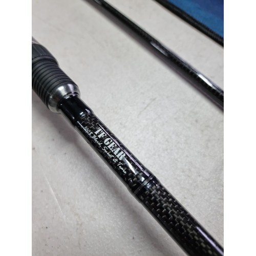 29 - A 12ft Matt Hayes fishing rod in a canvas bag made of carbon fibre in 2 parts and in overall good co... 