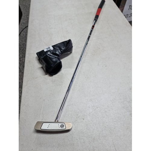 30 - An Odyssey white hot tour #2CS golf putter complete with leather head cover, stamped Macgregor.