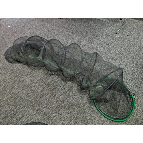 38 - A cased Keenets large keep net in overall good condition.