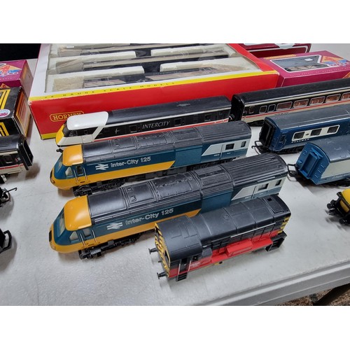 58 - A comprehensive collection of OO gauge locomotives, dummy locos, rolling stock and 4 boxed assorted ... 