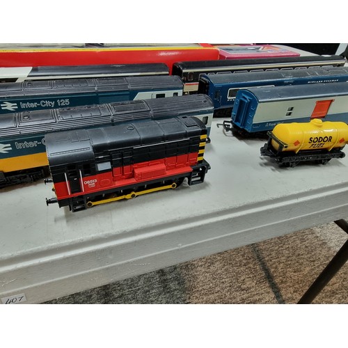 58 - A comprehensive collection of OO gauge locomotives, dummy locos, rolling stock and 4 boxed assorted ... 