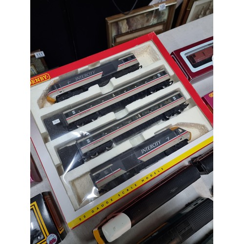 58 - A comprehensive collection of OO gauge locomotives, dummy locos, rolling stock and 4 boxed assorted ... 