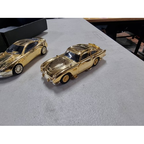 59 - 3x good quality diecast vehicle sets to include a Corgi 007 40th anniversary, 24ct gold plated 2 car... 