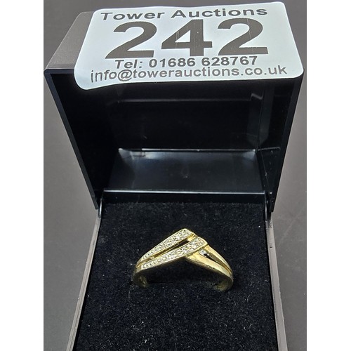 251 - A pretty 9ct yellow gold diamond wishbone ring inset with 5 small diamonds with a total combined wei... 