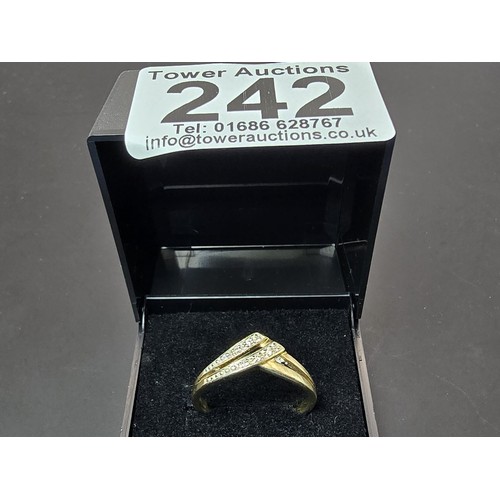 251 - A pretty 9ct yellow gold diamond wishbone ring inset with 5 small diamonds with a total combined wei... 