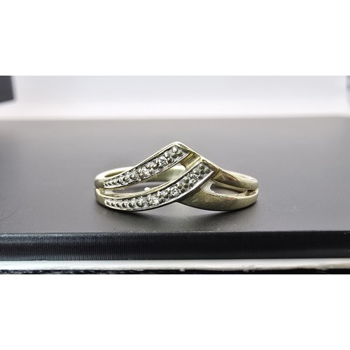 251 - A pretty 9ct yellow gold diamond wishbone ring inset with 5 small diamonds with a total combined wei... 