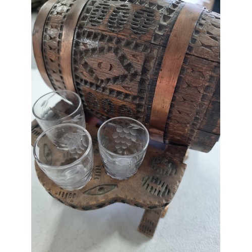 4 - Good quality small wooden liqueur set consisting of a wooden barrel on a wooden carved platform with... 