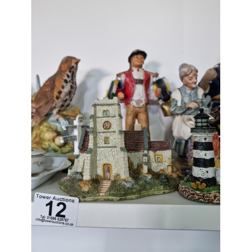 12 - A shelf containing a quantity of collectables including a quantity of miniature well detailed house ... 