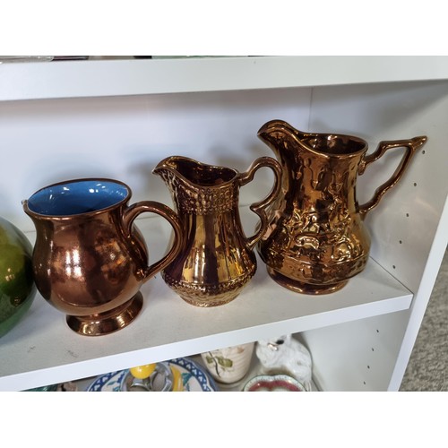 13 - 2 shelves of collectables including a silver tipped cut glass sugar sifter, a pair of cranberry glas... 