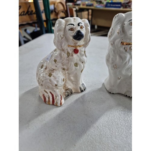 14 - A quantity of collectables including 2 Beswick Staffordshire dogs, a multi coloured ceramic centre p... 