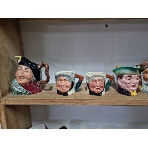 23 - A large collection of 23x Toby jugs of various sizes and makers including Royal Doulton Robinson Cru... 