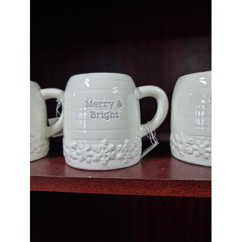 28 - A collection of 5x good quality ceramic Merry Bright mugs, as new by Langs, all in good order.