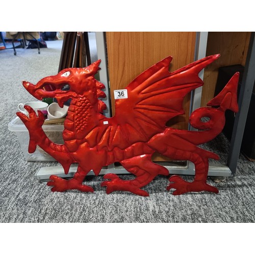 36 - Good quality tin welsh dragon wall hanger in good order measures 43cm high 65cm long