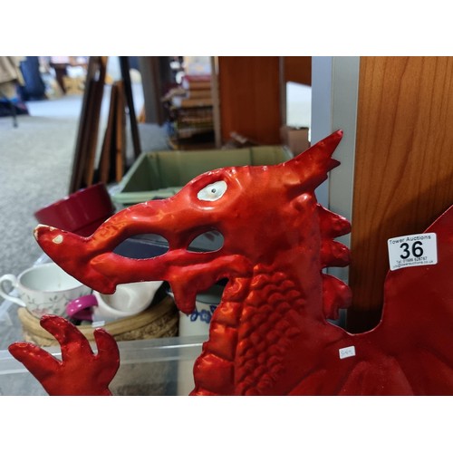 36 - Good quality tin welsh dragon wall hanger in good order measures 43cm high 65cm long