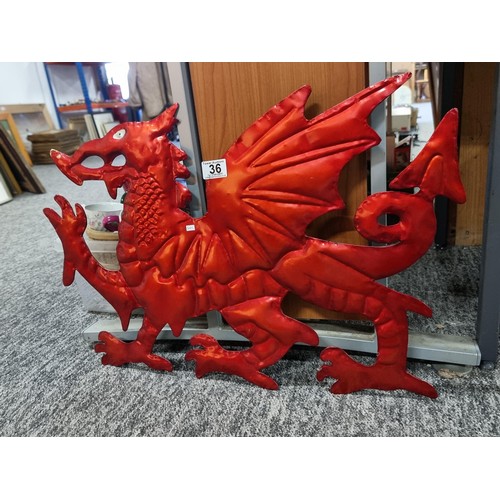 36 - Good quality tin welsh dragon wall hanger in good order measures 43cm high 65cm long