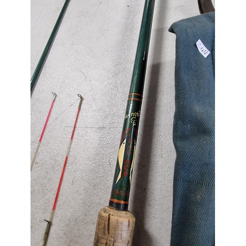 41 - Vintage 2 piece fishing rod labelled ' Swingster S' complete with cork handle and cotton case