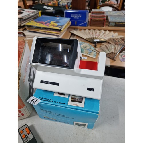 43 - Boxed Photofax Autoviewer 3 slide viewer along with a boxed Rank Aldis 2000 auto deluxe slide projec... 