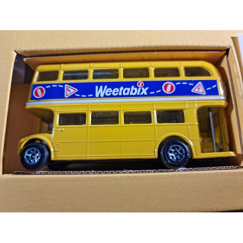 55 - 2x diecast model vehicle sets to include a Corgi Weetabix set 1989, inc articulated lorry, Aston Mar... 